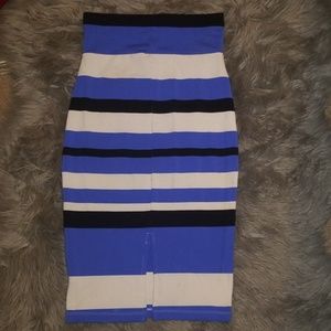 bebe Skirts - Bebe Midi Skirt with back slit. Very stretchy bebe Skirts - Bebe Midi Skirt with back slit. Very stretchy
